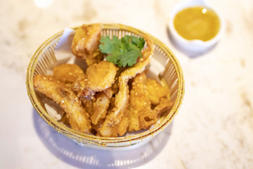 Deep fried salmon toro or fatty salmon served with spicy mixed wasabi sauce. Healthy food concept. 