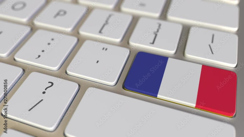 Poster key with flag of colombia on the computer keyboard switches to key with flag of france, translation 