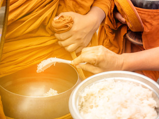 The monks of the Buddhist Sangha (give alms to a Buddhist monk), which came out of the Buddhist offerings in the morning. The tradition of giving alms to monks in Thailand.