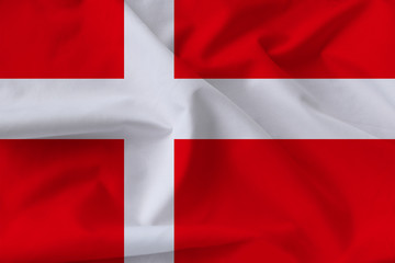 Beautiful silk flag of Denmark with soft folds in the wind