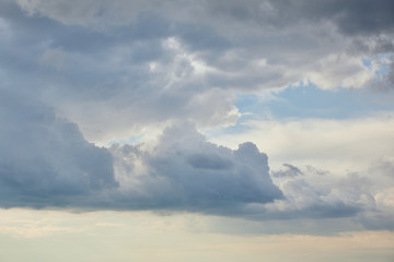 Fototapeta na wymiar Dark and overcast clouds on sky with copy space