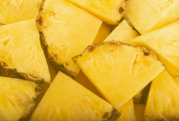 heap of slices of pineapple background