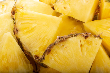 heap of slices of pineapple background