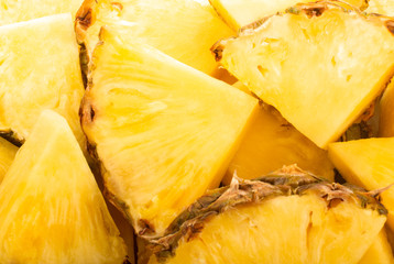 heap of slices of pineapple background