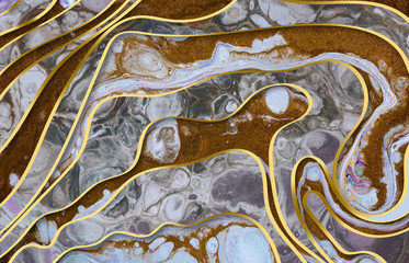 Marble abstract acrylic background. Marbling artwork texture. Agate ripple pattern. Gold powder.