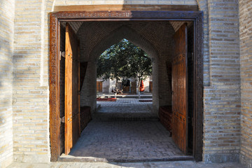 Entrance to the courtyard of the old building of Bukhara, Uzbekistan.