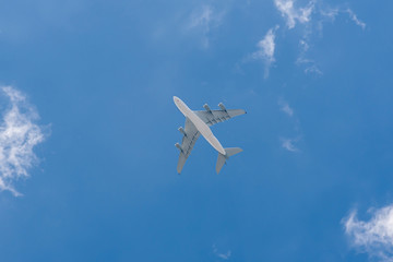 Passenger airplane against blue sky