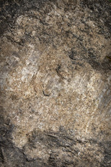 Dark textured stone surface