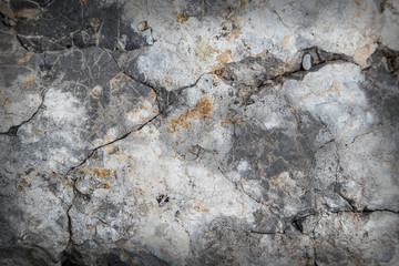 Dark textured stone surface
