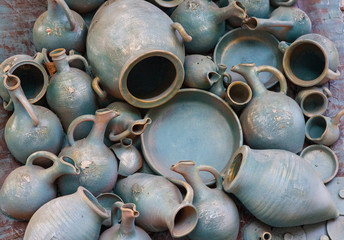 Fototapeta na wymiar Georgia. Many blue clay ceramic pots in Kindzmarauli vineryard,