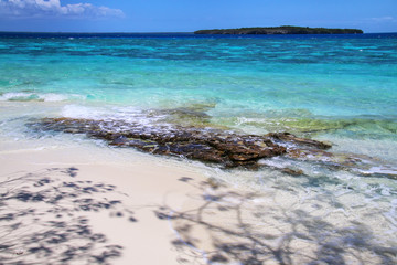 Sandy beach at Gee island in Ouvea lagoon, Loyalty Islands, New Caledonia