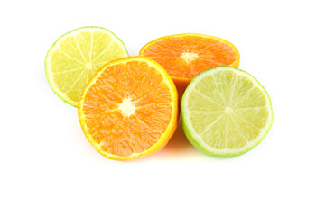 Fruit assortment of tangerine and lime with leaves