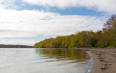 Sears Island with clouds and blue sky above