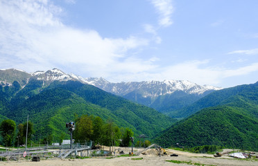 Fototapeta na wymiar Mountain landscape in spring at the tourist resort Rosa Khutor in Sochi