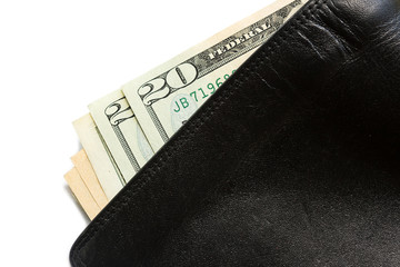 Closeup twenty dollar bill in old black leather wallet. Business object white background.