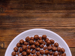 Breakfast with chocolate cereal and milk