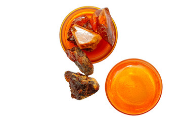 Amber. Pieces of ancient petrified resin. Natural mineral and crystal. Transparent amber circles. Sunstone in different forms. Natural material for jewelers. Amber from Japan Top View