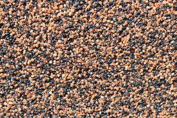 Black brown and orange small stones texture