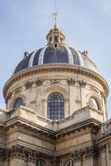 Fototapeta na wymiar Close up on the dome of the Institut de France facing the Pont des Arts in Paris