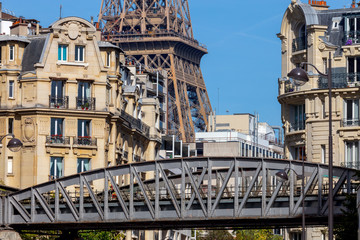 Paris. Metro bridge on the background of the Eiffel Tower.