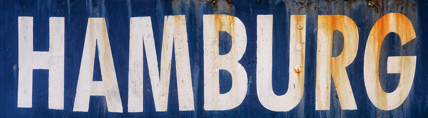 Hamburg in white capital letters as text on blue background.