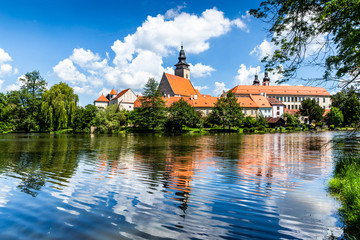 Castle Telc across pond. UNESCO World Heritage Site. South Moravia, Czech Republic.