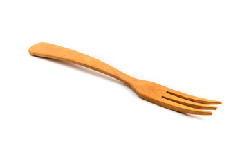 Fork made of wood on a white background