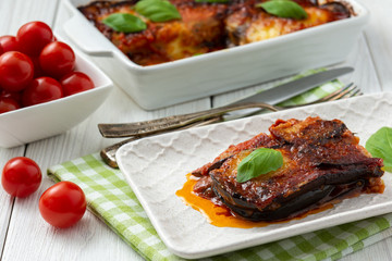 Eggplant casserole with parmesan, melanzane alla parmigiana, italian cuisine.