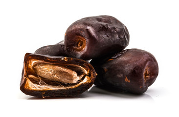 closeup of dates on white background
