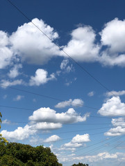 Light clouds over Sheffield in bright blue sky