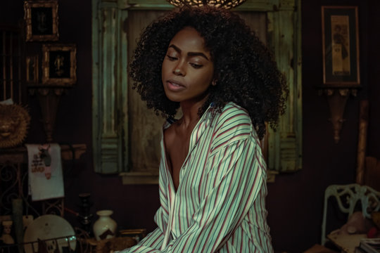 woman in gree dress shirt