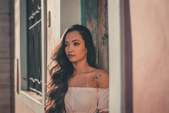 woman standing on front of door