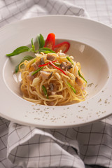 spaghetti with tomato sauce and basil