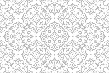 Wallpaper in the style of Baroque. Seamless vector background. White and grey floral ornament. Graphic pattern for fabric, wallpaper, packaging. Ornate Damask flower ornament.
