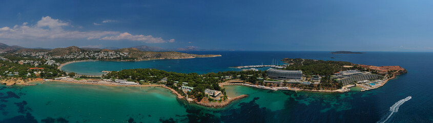 Aerial drone bird's eye panoramic photo of famous celebrity sandy beach of Astir or Asteras in...