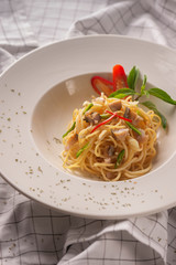 spaghetti with tomato sauce and basil