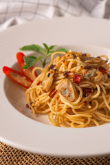 spaghetti with tomato sauce and basil