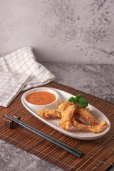 grilled salmon steak with sauce and vegetables