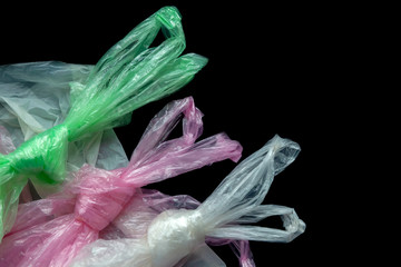 Plastic transparent bags in different colors. Used plastic bag for recycling. Recycling plastic...