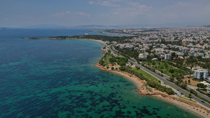 Fototapeta na wymiar Aerial drone bird's eye view of famous seascape of Athens Riviera, Voula, Athens Riviera, Attica, Greece