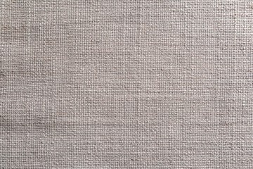 Light natural beige textile texture for the background. Natural canvas closeup texture.