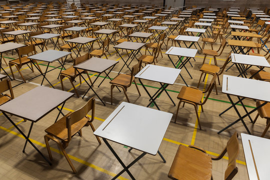 Exam Tables Set Up In A Sports Hall For Exams In A High School & Sixth Form