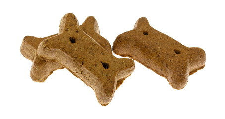 Peanut butter dog biscuits on a white background.