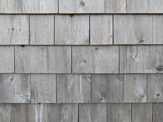 Rows of wood shingles grayed with age