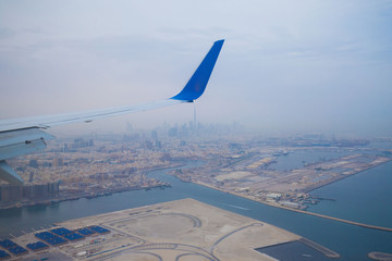 UAE.  View on city Dubai in airplane flight