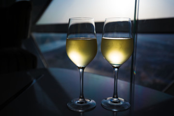 UAE. White wine in window background