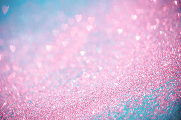 Abstract red pink and blue heart glitter light bokeh holiday and festive party background. Love sentiment and St Valentine's day concept with copy space
