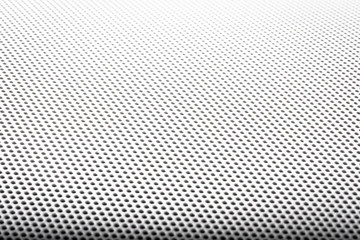 Abstract background is a metal grid, white cover round speaker