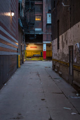 Empty Loading Dock in Alley at night with No Smoking Sign