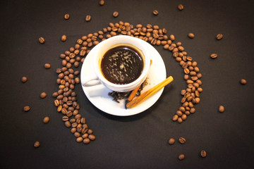 cup of coffee on black background